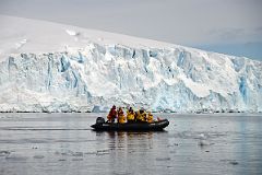 19A Zodiac With Steep Glacier Behind At Cuverville Island On Quark Expeditions Antarctica Cruise.jpg